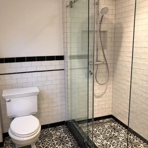 https://www.cranburydesigncenter.com/wp-content/uploads/2018/05/we-love-the-floor-tile-in-our-client-s-newly-renovated-bathroom-bathremodel-blackandwhitetiles-newjerseykitchenandbathdesigncenter-designnj-480x480.jpg