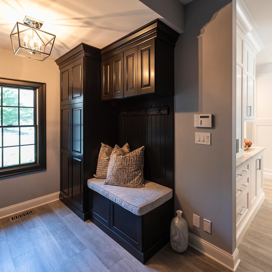 https://www.cranburydesigncenter.com/wp-content/uploads/2019/09/we-love-this-cozy-mudroom-area-off-our-client%E2%80%99s-newly-renovated-kitchen-mudroom-blackcabinets-newjerseykitchenremodel-newjerseydesign-njkitchenremodeler-designnj-mudroomideas.jpg