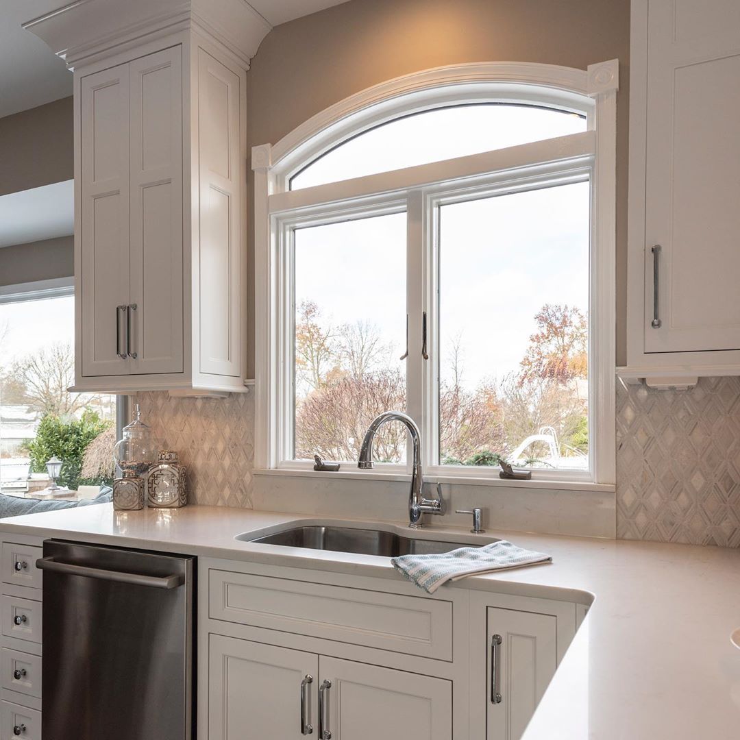 https://www.cranburydesigncenter.com/wp-content/uploads/2020/02/a-great-view-in-our-client%E2%80%99s-beautiful-new-kitchen-quartzcountertops-insetcabinets-baywindow-njkitchen-designnj-newjerseykitchenremodel.jpg